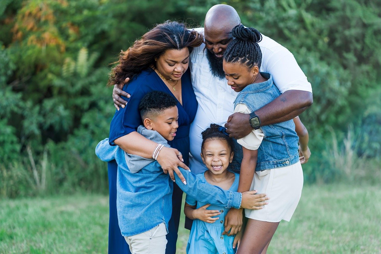 Happy family celebrating financial recovery